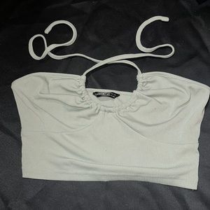 This is a light green crop top it’s a size small worn 1 time.